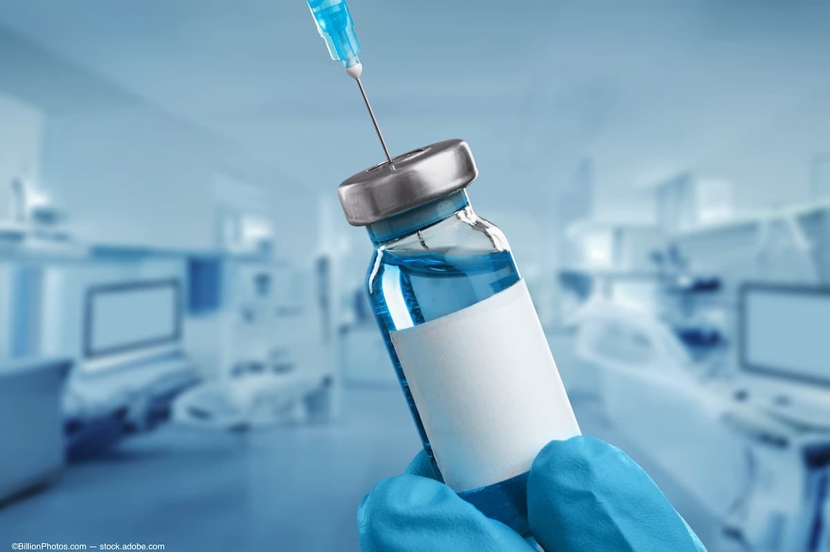 A dosing vial and syringe (Image Credit: AdobeStock/BillionPhotos.com)