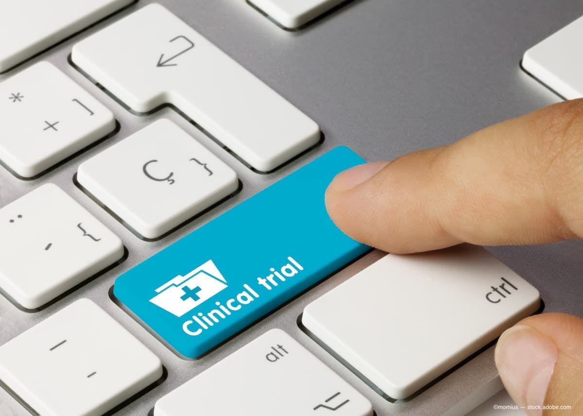 The starting of a clinical trial by pressing a button (Image Credit: AdobeStock/momius)
