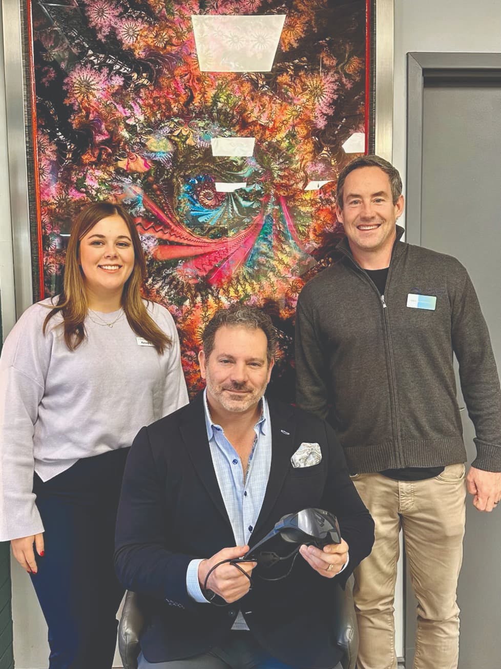 Steve R. Sarkisian Jr, MD, and Kelsey O’Neil (Glaukos Corporation diagnostics team) after a successful implementation visit with Brian Murphey from Radius XR.